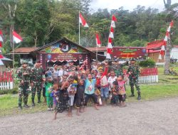 Satgas Pamtas Yonif 641/Bru Berbagi Snack Kepada Anak Anak Kampung Eroma Distrik Kurima