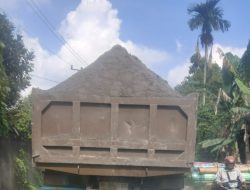 Jalan Rusak dan Berlobang Diduga Akibat Mobil Truk Ber Plat Luar Sumatra utara.