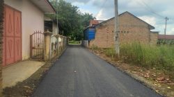 Dinas PUPR Kota Tebingtinggi Selesai Aspal Hotmix Gang Melati dan Gang Krompol Kelurahan Padang Merbau Kecamatan Padang Hulu.