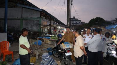 Sekdako Tebingtinggi Himbau’ Pedagang Tempati Kios Revitalisasi Pasar Inpres.